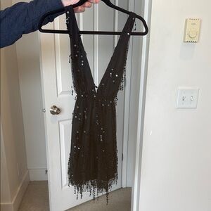Black Mini Dress with Sequins and Plunging V-Neck